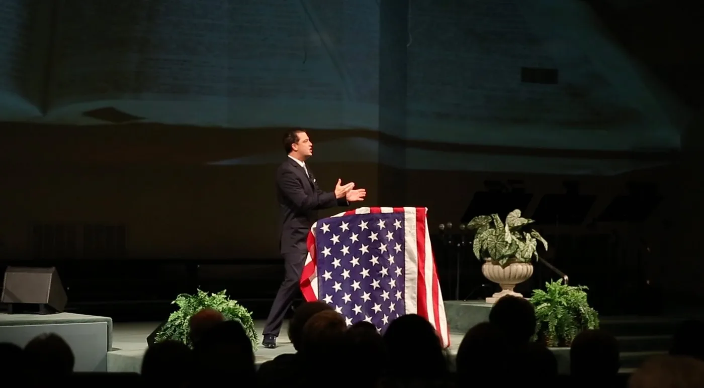 Terry Tripp speaking at a ministry event